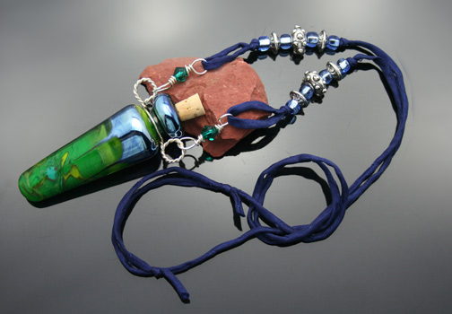 lampwork glass poison bottle necklace